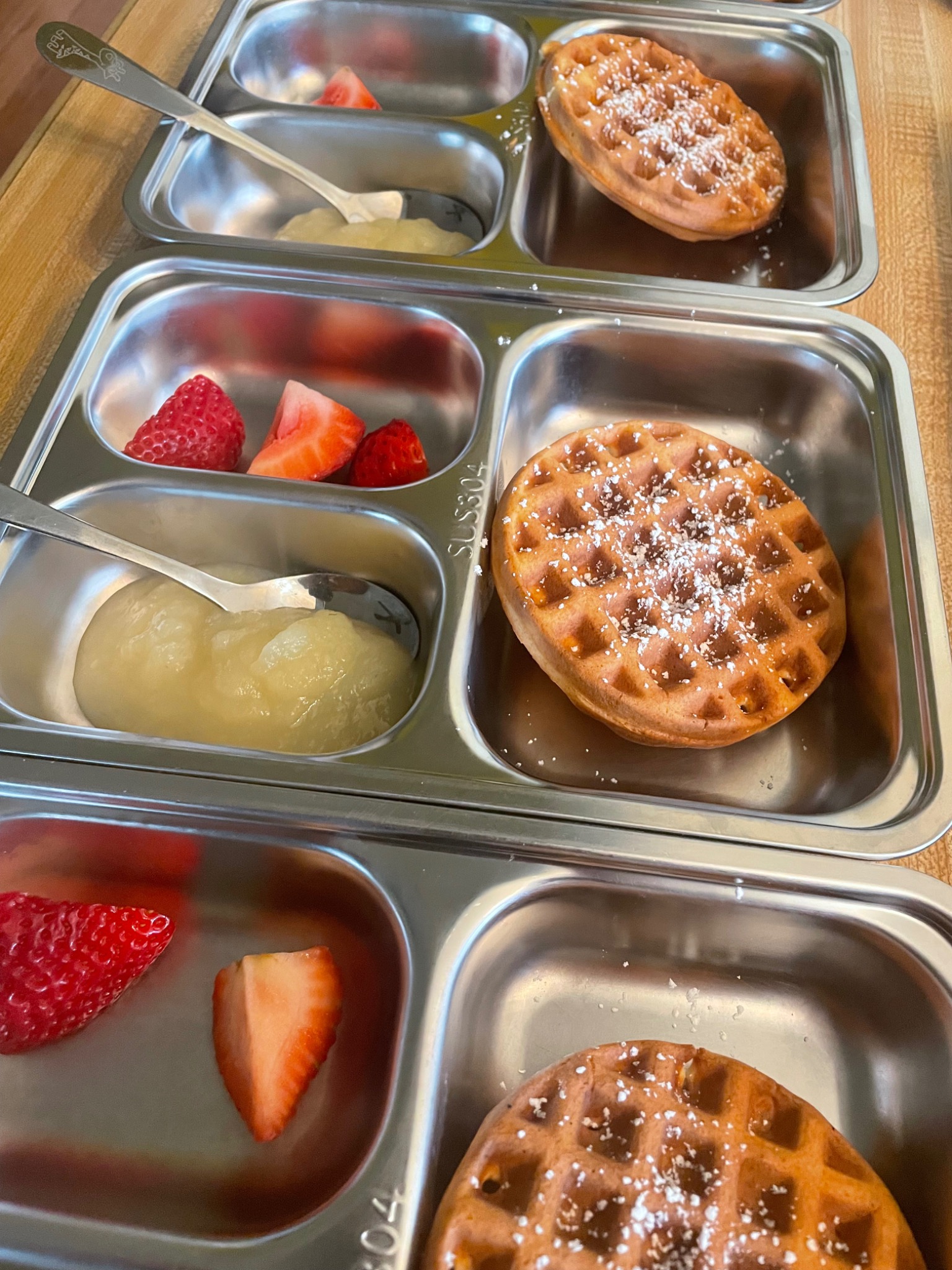 Belgian waffles served in daycare meal trays